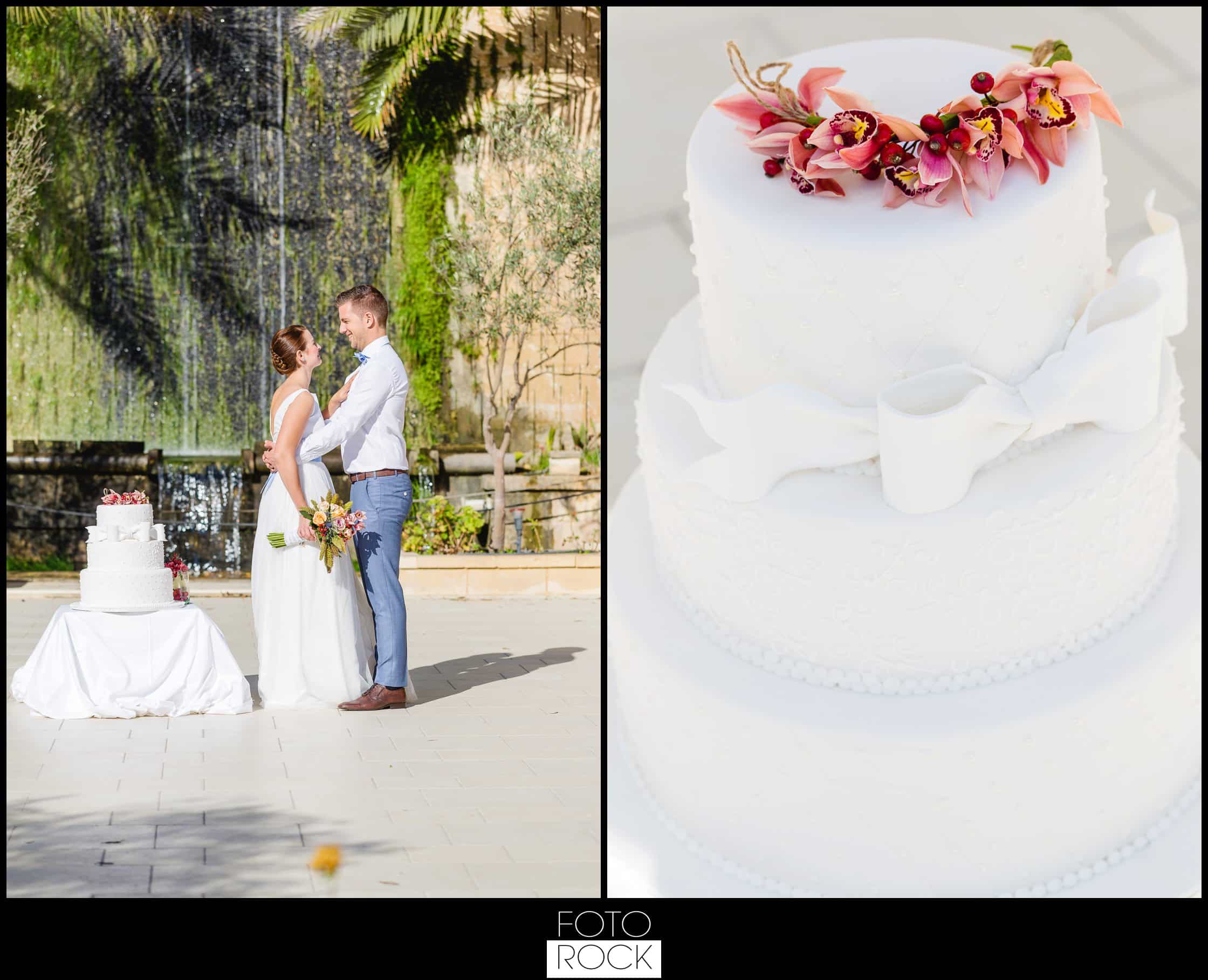 Hochzeit Malta Brautpaar Hochzeitstorte Wasserfall Palmen Blumen